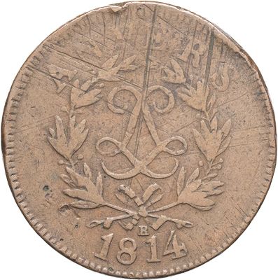 gros plan d'une pièce de monnaie sur fond blanc