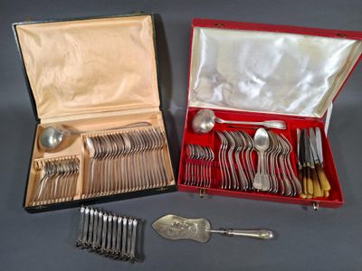 silverware in a red case with a silver spoon and spoon rest
