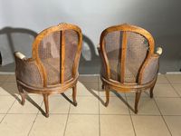 Paire de bergères à fonds et assises cannées en bois sculpté… (photo 5)