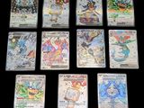 pokemon trading card game set with a lot of cards on a table