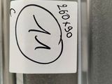 a sticker on the door of a stainless steel refrigerator
