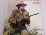 la couverture du livre *La fiste des Sioux*, sur laquelle figure un cow-boy tenant un pistolet