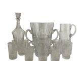 a lot of glass items that are sitting on a table