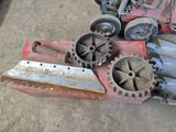a pile of machinery that is sitting on the ground