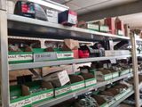 many boxes of tools on the shelves in the store