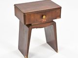 an image of a small wooden table with a drawer on it