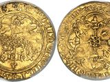a gold coin with an image of a man on a horse