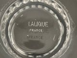 a close up of a glass container with a label on it