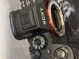 a close up view of a camera with a lens attached to it