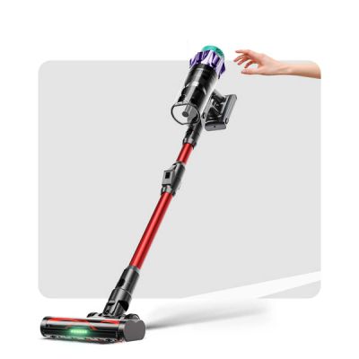 a person using a cordless vacuum cleaner to clean the floor