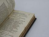 an open book that is sitting on a table