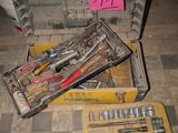 many tools that are sitting on the floor in the room
