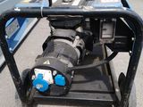 an image of a portable generator in a parking lot