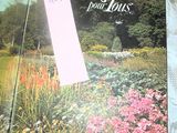 un livre sur la couverture duquel figure l'image d'un jardin