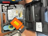 a tool box that has a tool in it on a table