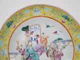 a plate with a picture of a man and a woman on it