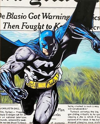 a newspaper advertisement with a picture of a batman on it