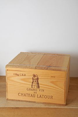 a wooden box that has a wine label on it