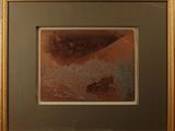 une image représentant un tableau représentant un paysage désertique dans un cadre doré