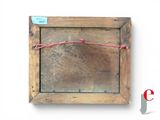 a picture of a wooden frame with a red string around it