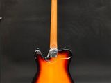 an electric guitar sitting on top of a stand in front of a black background