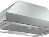 an image of a stainless steel range hood with a light on it