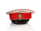 an image of a red hat with a gold emblem on it