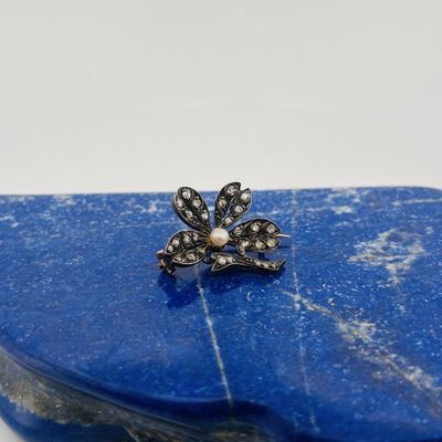 a close up of a ring on top of a blue stone