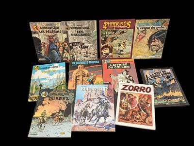 a lot of books that are sitting on a table