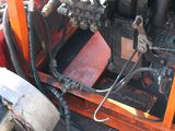 a small engine that is sitting on the back of a truck