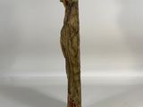 pair of carved wood figures of a woman and a man