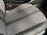 the interior of a car with the seat up and the front seats down