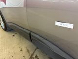 a close up of a car with a sticker on it