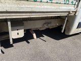 a close up of the back of a truck with graffiti on it