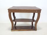 a small wooden table with a shelf on top of it