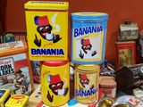 many different types of tins that are on the table