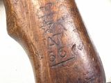 a close up of a wooden object on a table