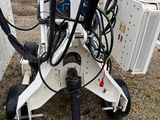 a small machine that is sitting on the ground