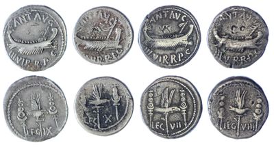 six ancient roman coins are shown in a row on a white background