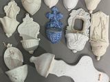 a lot of white and blue ceramic items on the table
