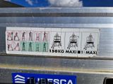 a sticker on the back of a truck with a picture of a tower