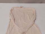 a picture of a shirt on a white table