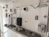 an image of a room with electrical equipment on the wall