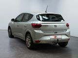 a silver car that is parked in a room