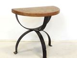 a small table with a wooden top and metal legs