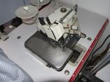 a sewing machine that is sitting on a table