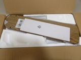a skateboard that is in a box on the floor