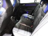 the back seats of a car are black and blue in color