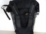 a black backpack that is sitting on the floor