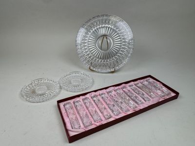 a glass plate and a glass tray on a table